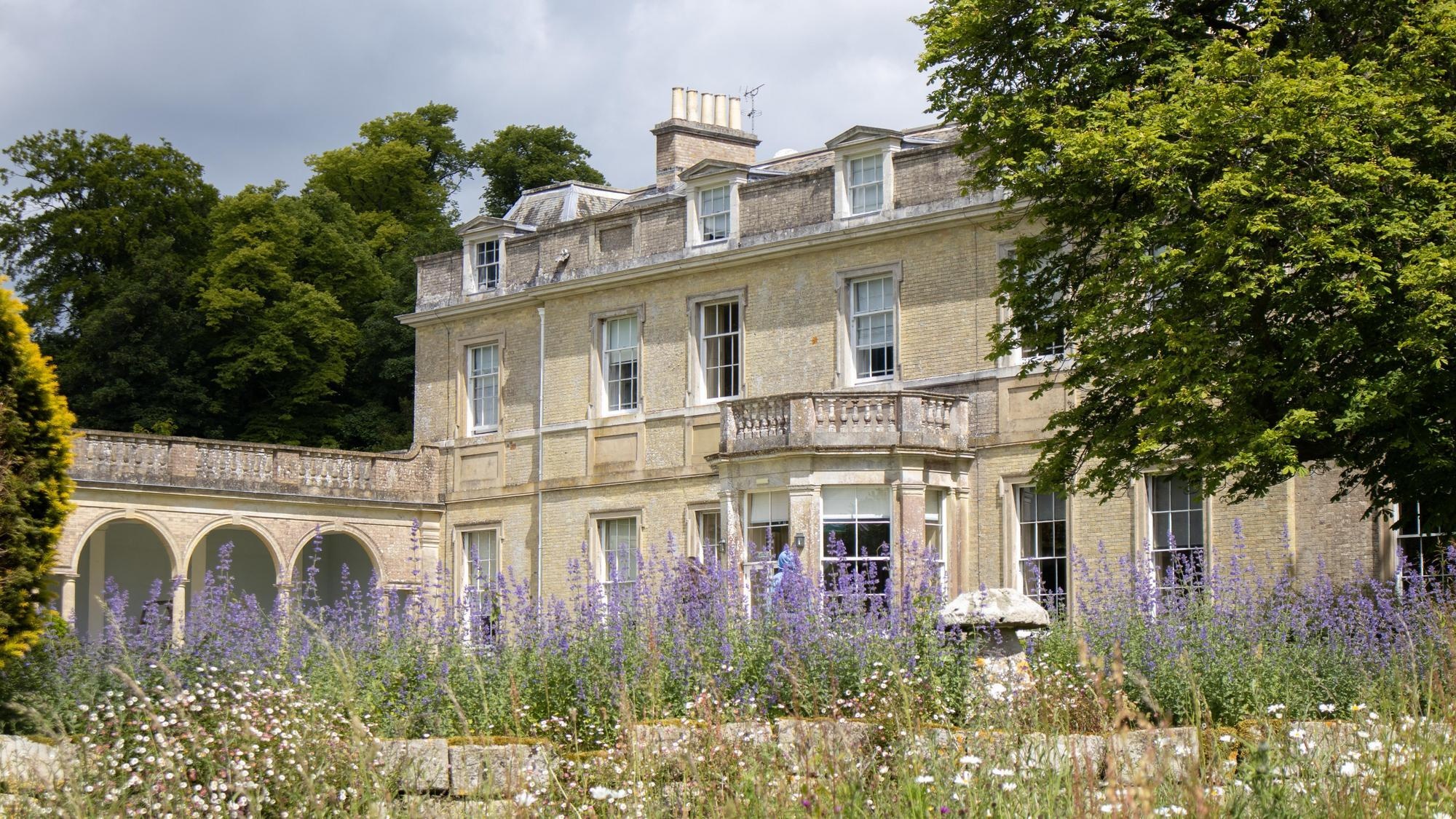 Aurora Boveridge School, with aglimse of the beautiful garden and green lawns
