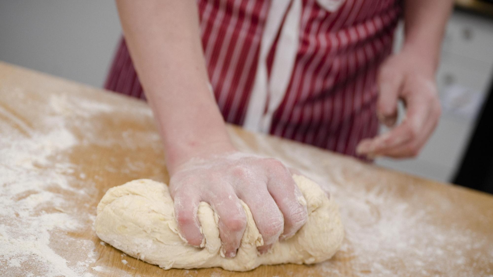 student cooking at Aurora Chaldon School